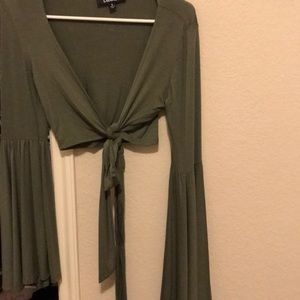 Green tie front with bell sleeves crop top.